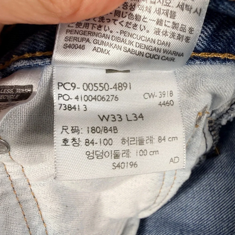 Levi's 550 Relaxed Fit Jeans 33x34 Blue Medium Wash Tapered Leg Cotton Denim